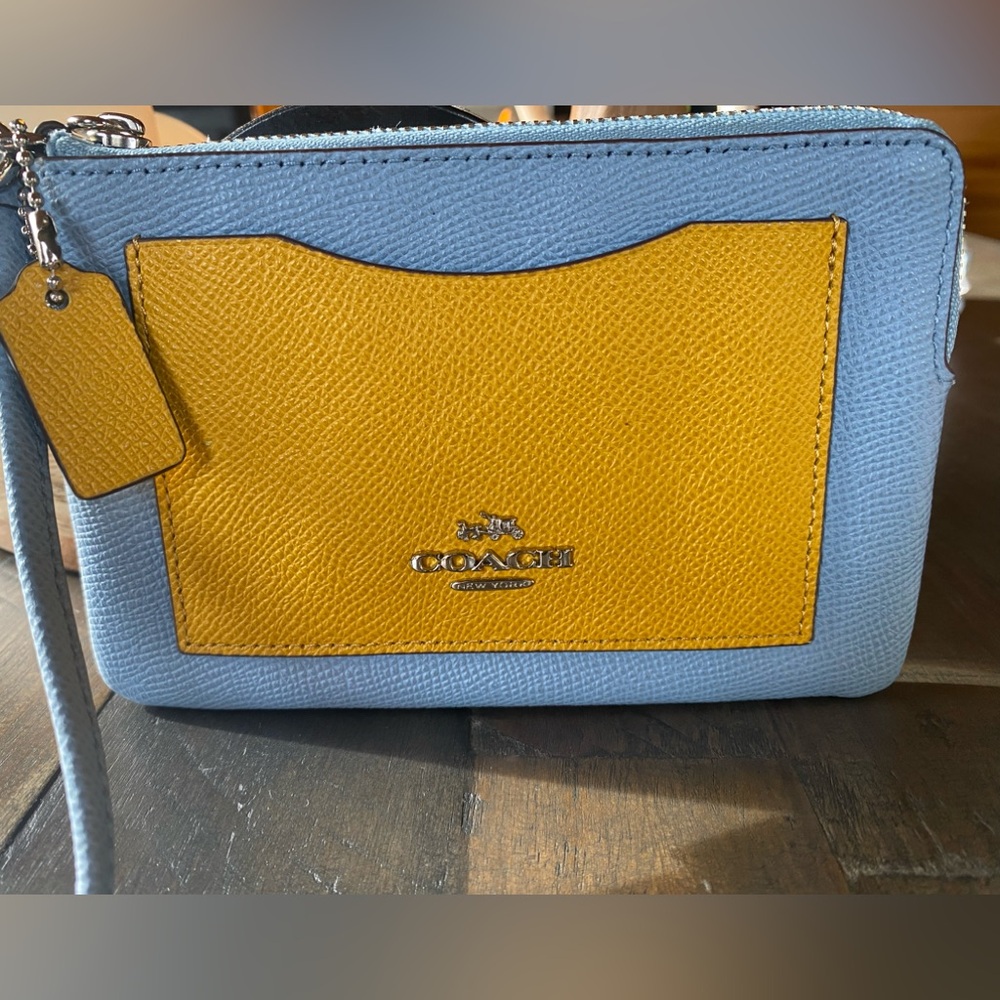 - Coach blue & yellow wristlet.